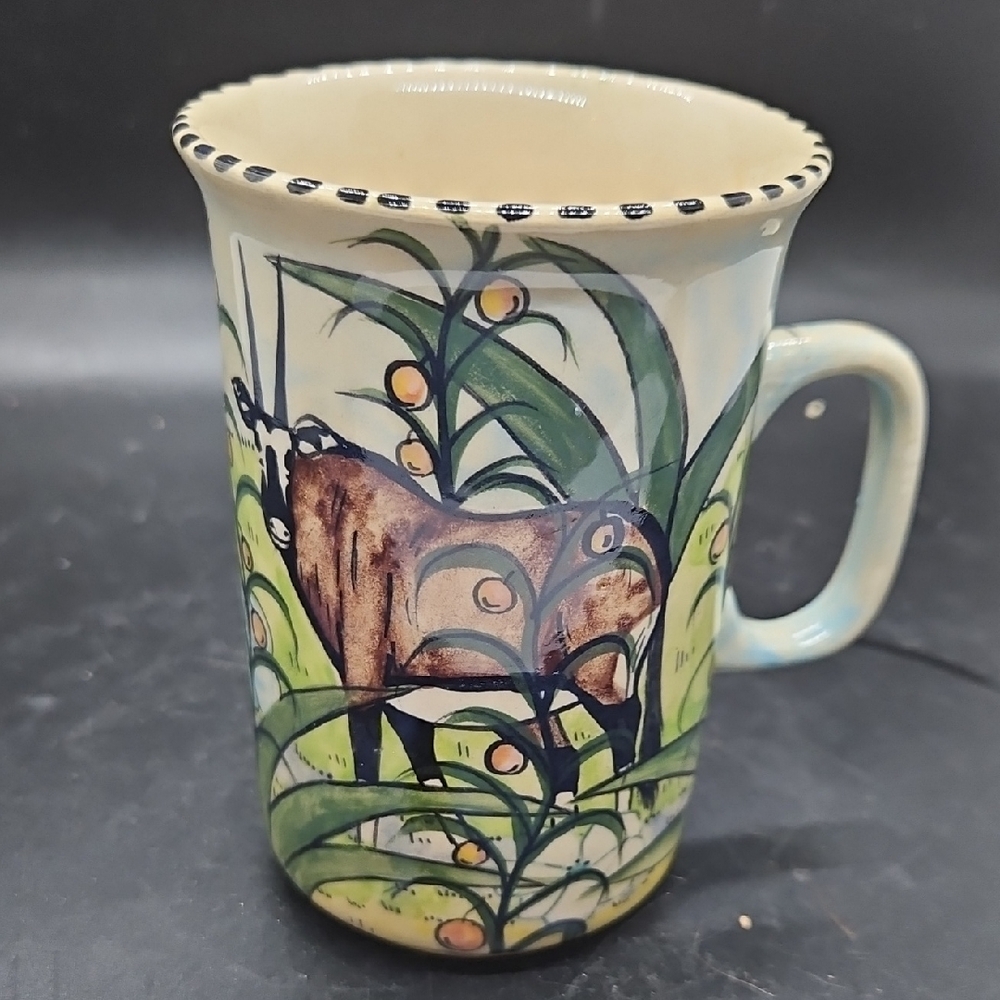 Handcrafted Ceramic Mug with Animal Design